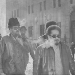 Bobby Rush (fur cap), Illinois chairman of the Black panthers, and some of his aldes, leave the Criminal Courts Building after attending a hearing into the killing of Panther leaders Fred Hampton and Mark Clark.