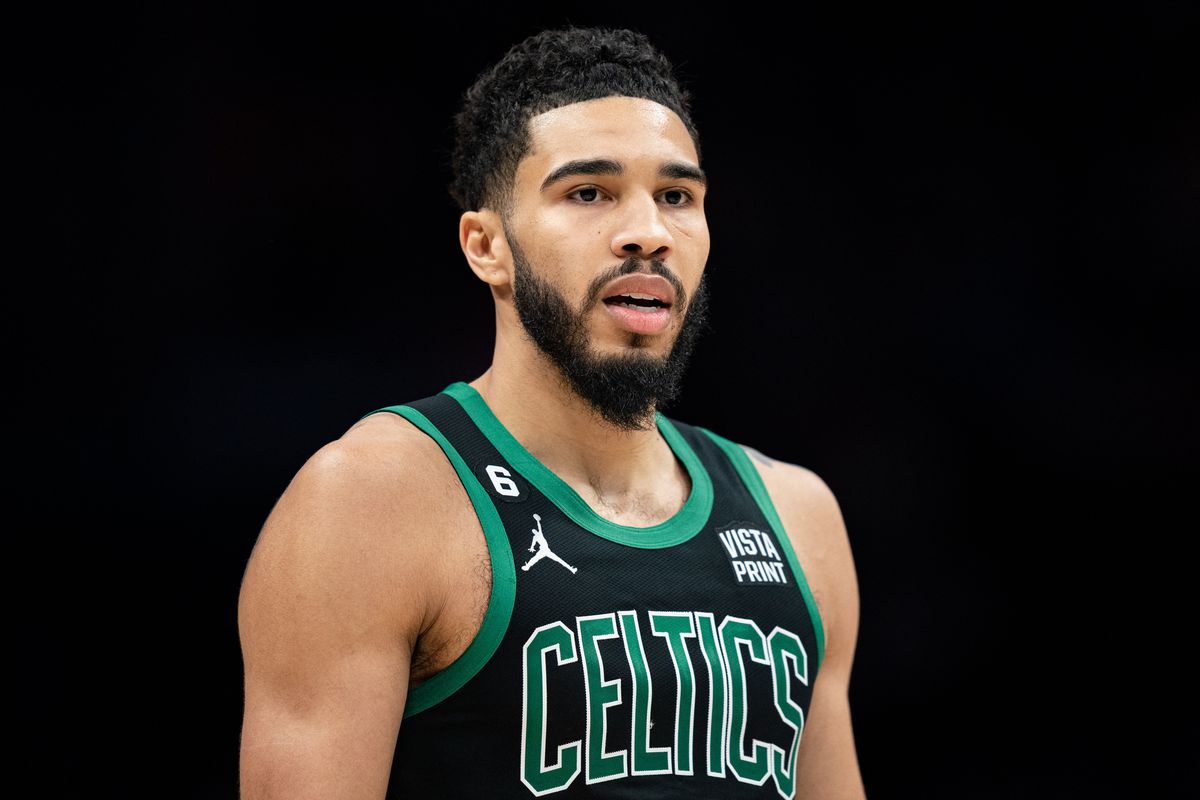 Jayson Tatum #0 of the Boston Celtics looks on during their game against the Charlotte Hornets at Spectrum Center on January 16, 2023 in Charlotte, North Carolina.