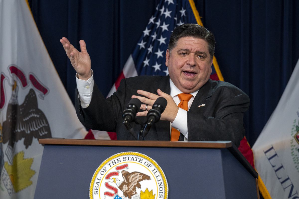 Gov. J.B. Pritzker gives a COVID-19 update to reporters in the Blue Room at the Thompson Center last week.