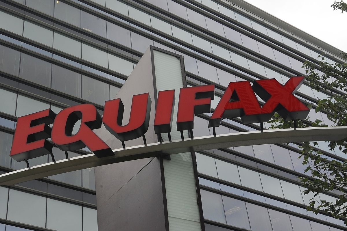 FILE - This July 21, 2012, file photo shows signage at the corporate headquarters of Equifax Inc., in Atlanta. Equifax will pay up to $700 million to settle with the Federal Trade Commission and others over a 2017 data breach that exposed Social Security 