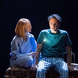 Ginny Weasley-Potter (Poppy Miller) tries to console her husband, Harry Potter (Jamie Parker) in the production of "Harry Potter and the Cursed Child."
