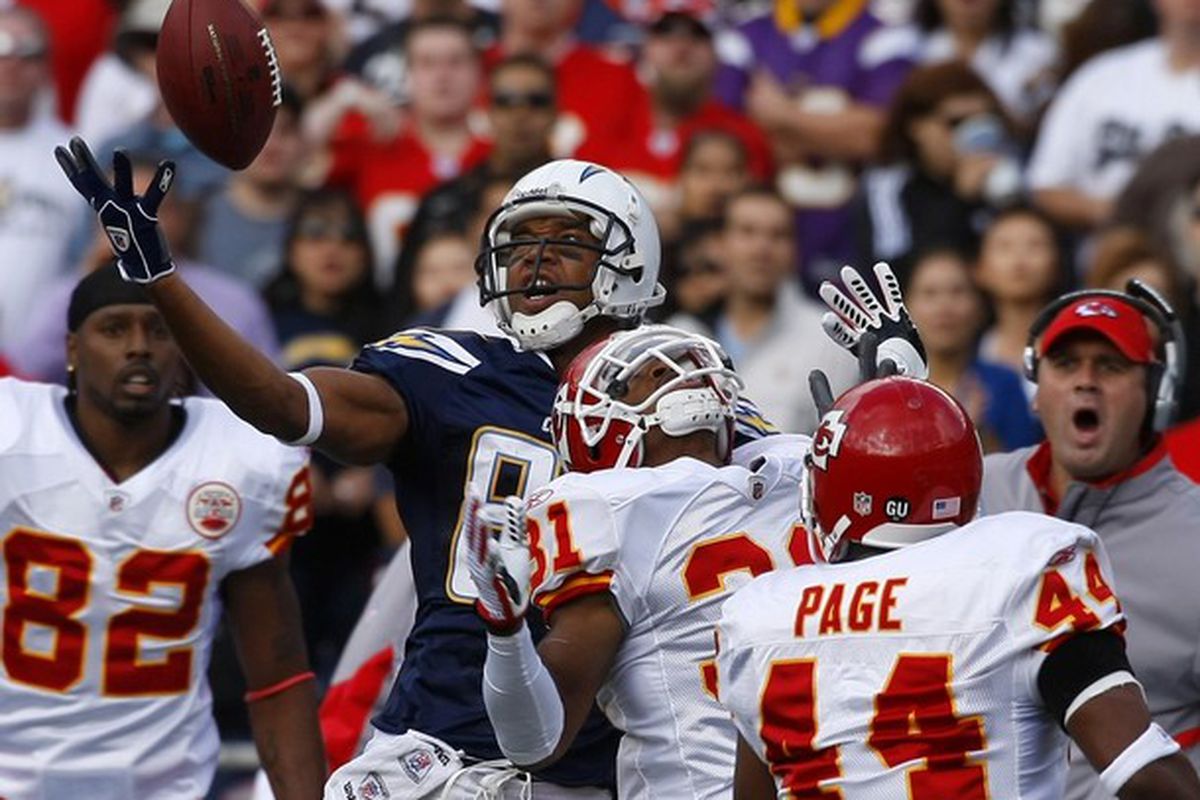 San Diego Chargers wide receiver Malcom Floyd reaches out over Kansas City Chiefs corner back Maurice Leggett (31) to pull down a first quarter pass during NFL football game in San Diego, California November 9, 2008.