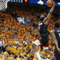 Houston Rockets guard James Harden (13) dunks over the Utah Jazz during the NBA playoffs in Salt Lake City on Saturday, April 20, 2019. The Jazz lost 104-101.