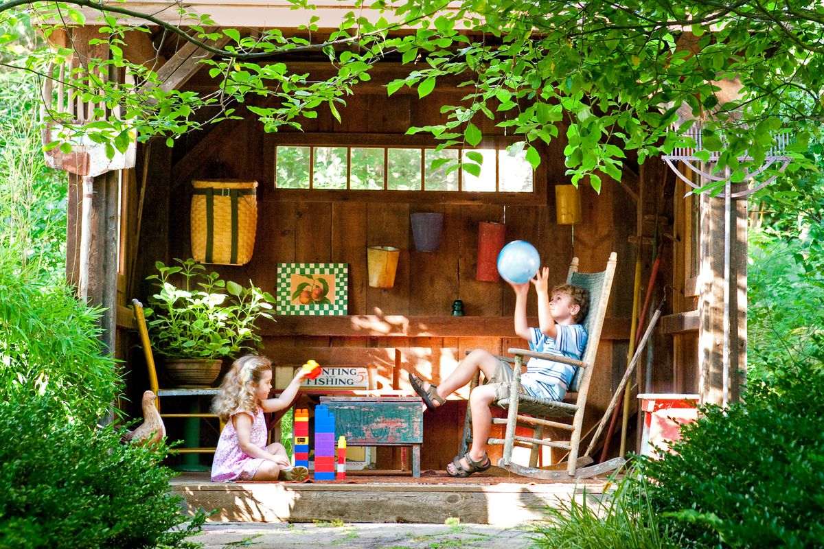 Kids playhouse in backyard