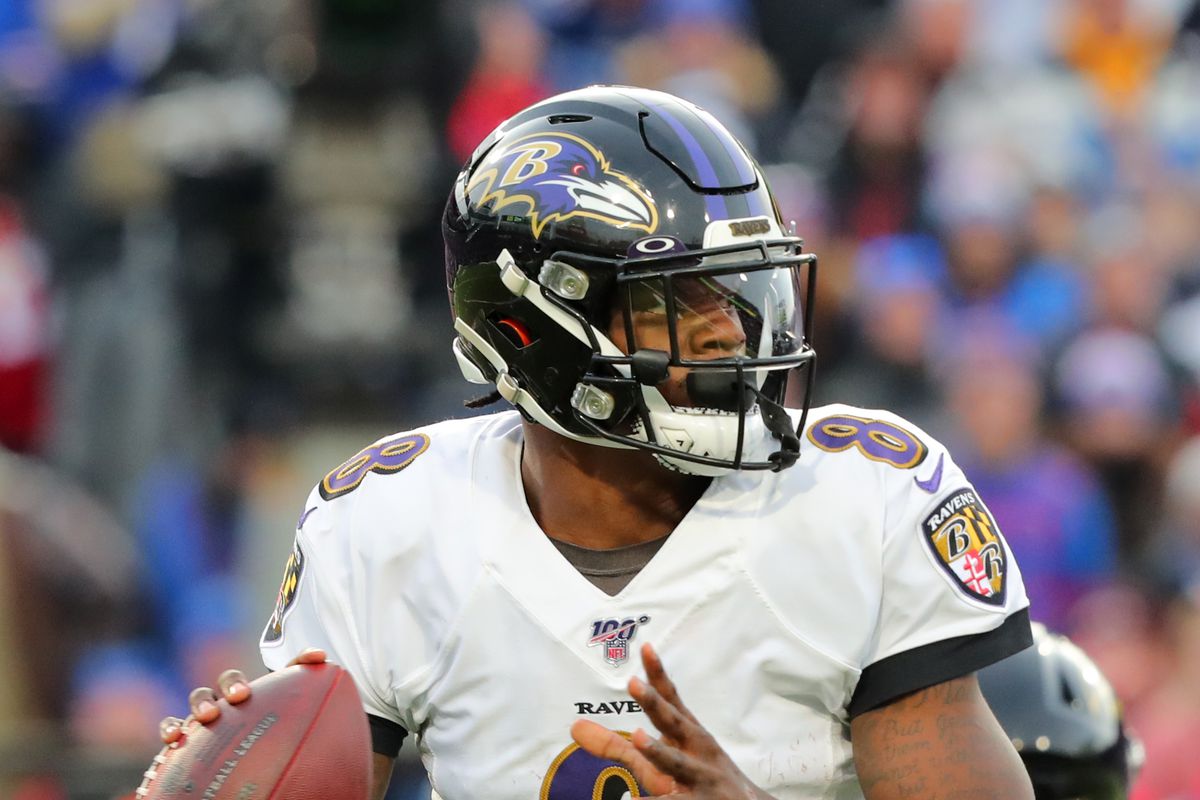 Lamar Jackson of the Baltimore Ravens drops back to throw a pass during the fourth quarter against the Buffalo Bills at New Era Field on December 8, 2019 in Orchard Park, New York.
