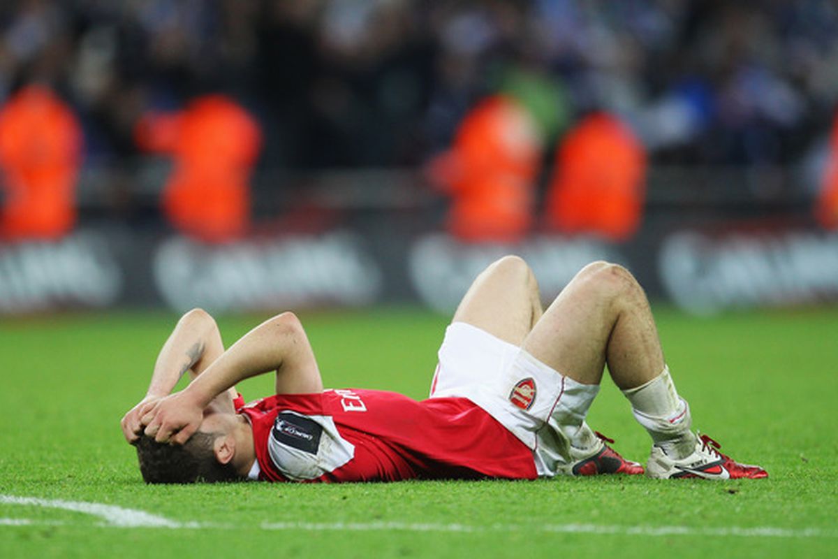 LONDON, ENGLAND - FEBRUARY 27:  Jack Wilshere of Arsenal holds his head in despair after the Carling Cup Final between Arsenal and Birmingham City at Wembley Stadium on February 27, 2011 in London, England.  (Photo by Alex Livesey/Getty Images)