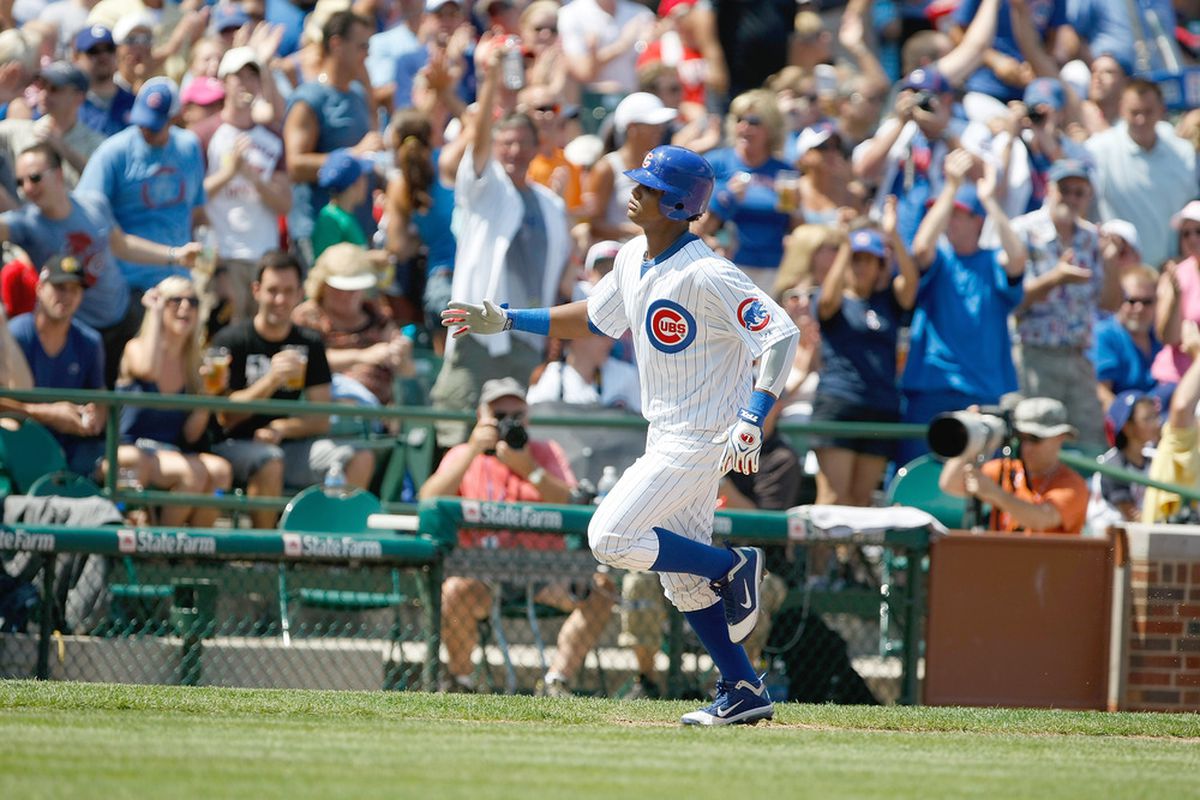 Starlin Castro of the Chicago Cubs runs after hitting a home run against the Cincinnati Reds at Wrigley Field on August 7, 2011 in Chicago, Illinois. (Photo by Scott Boehm/Getty Images)