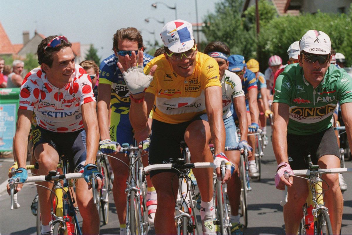 Miguel Indurain rides to his fifth Tour de France victory, passing through the Champs-Élysées