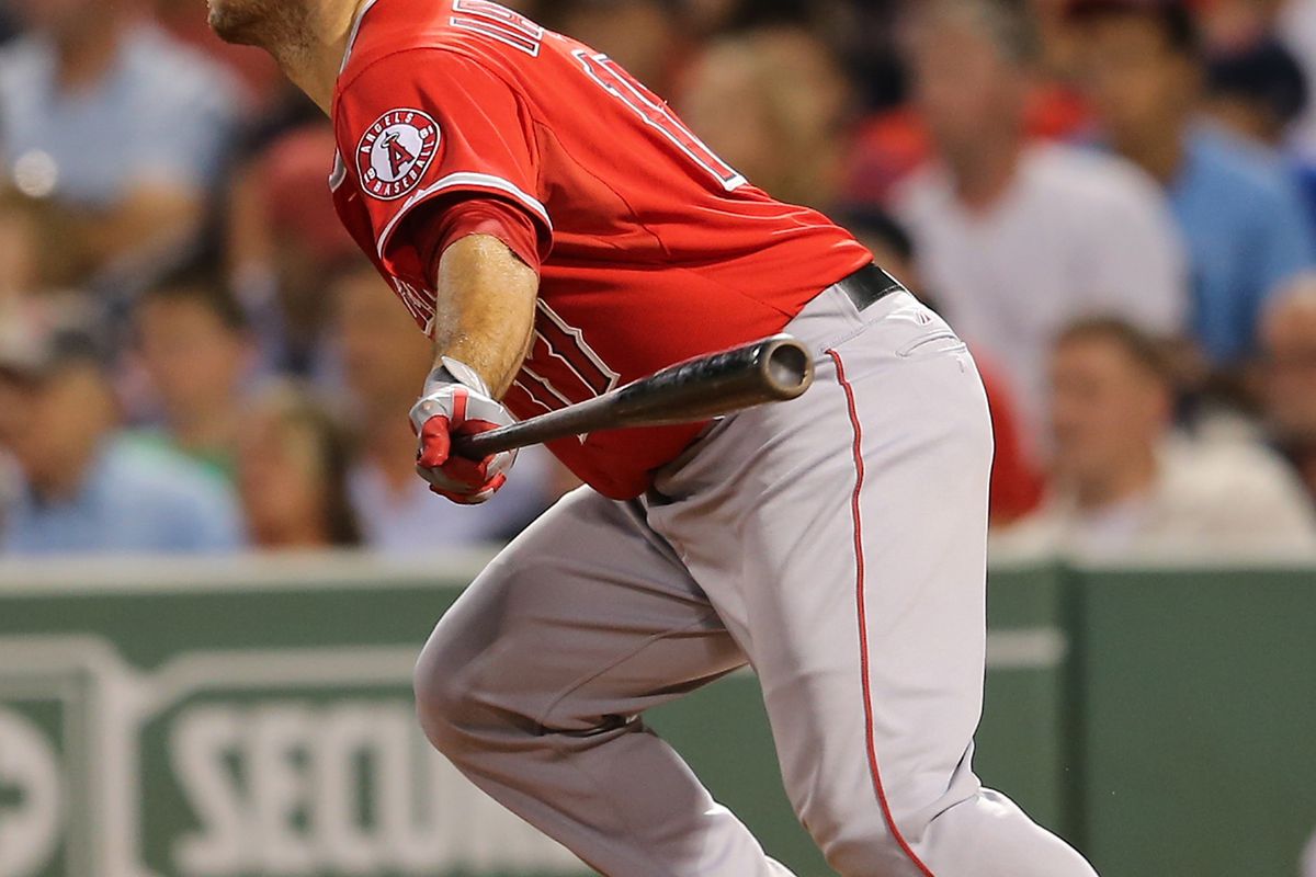 FOXBORO, MA - AUGUST 22: Chris Iannetta #17 of the Los Angeles Angels knocks in a run against the Boston Red Sox in the third inning at Fenway Park on August 22, 2012 in Boston, Massachusetts.  (Photo by Jim Rogash/Getty Images)