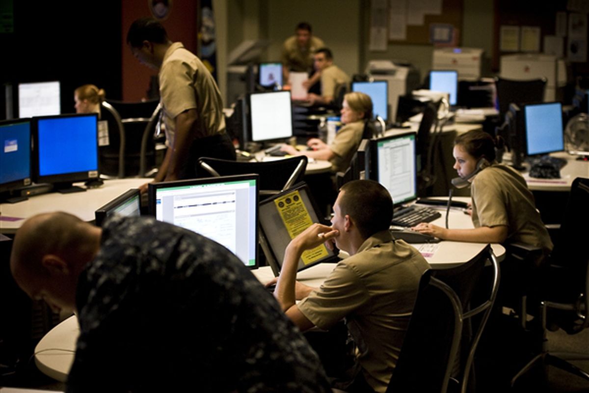 Military people using computers
