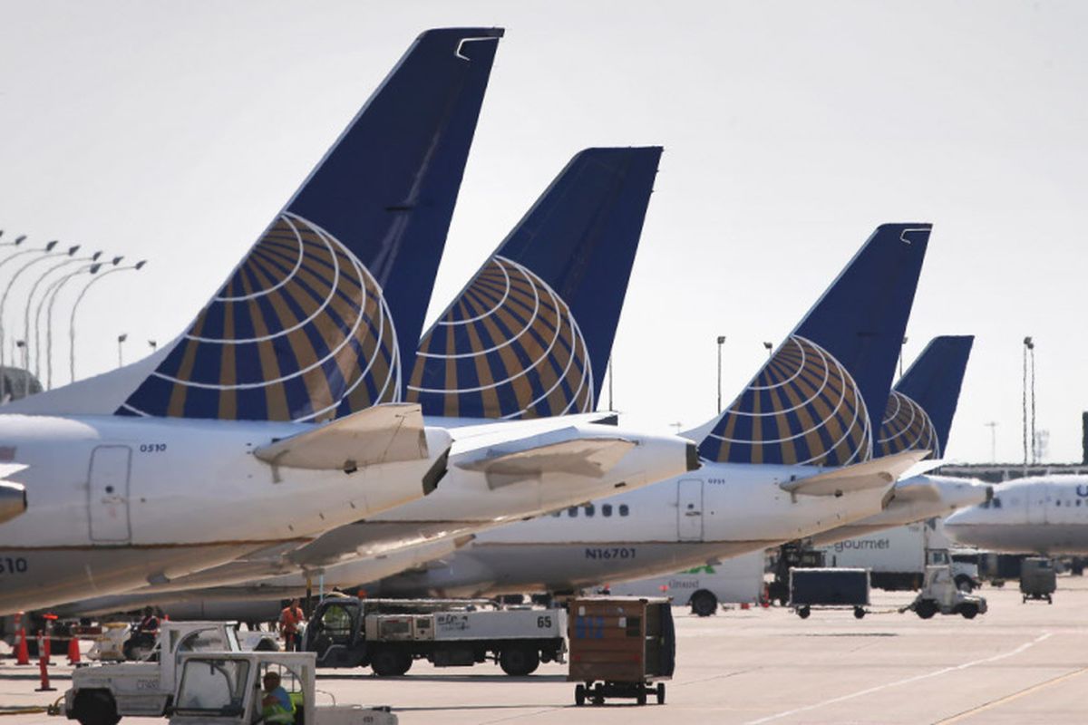 United Airlines jets sit at gates at O’Hare International Airport in Chicago.