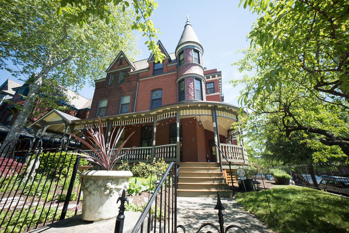 A Queen Anne Victorian with a wrap-around porch in West Philly.