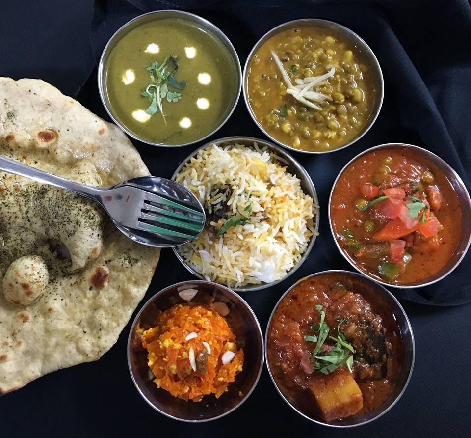 A selection of thalis at Nirmal’s in Pioneer Square, with a side of naan.