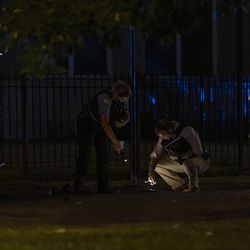 Police investigate the scene at the corner of W Douglas Blvd and S Ridgeway Ave in Lawndale, Wednesday, July 21, 2021. 