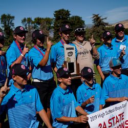 Beaver celebrates their team title in the 2A high school golf state tournament at Rose Park Golf Course in Salt Lake City on Thursday, Sept. 26, 2019.