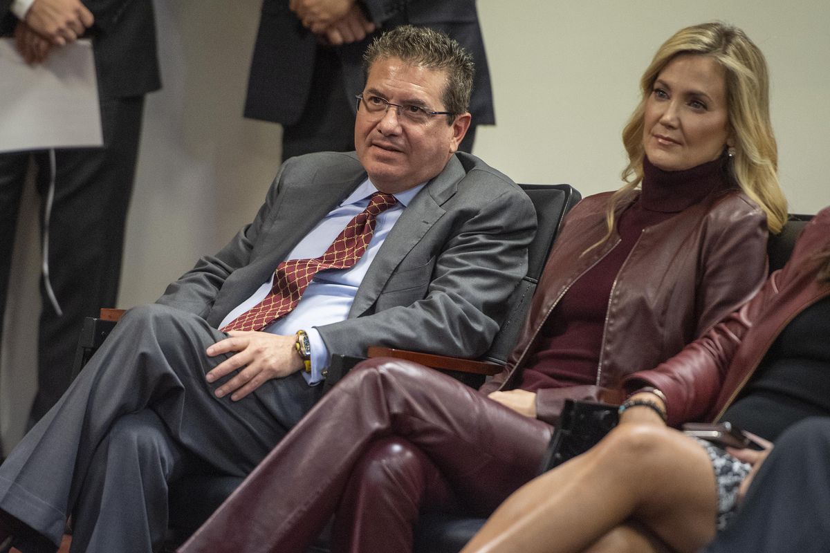 Washington Redskins owner Daniel Snyder and his wife Tanya look on as head coach Ron Rivera speaks during his introductory press conference at Inova Sports Performance Center.