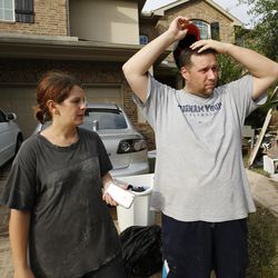 Will and Tasha Willis talk about cleanup efforts at their home  in Klein, Texas, on Wednesday, Aug. 30, 2017, following Tropical Storm Harvey.