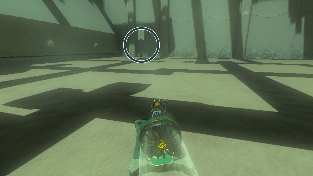 Link driving a sled contraption over to a chest hanging by a rope in the Kudanisar Shrine in The Legend of Zelda: Tears of the Kingdom