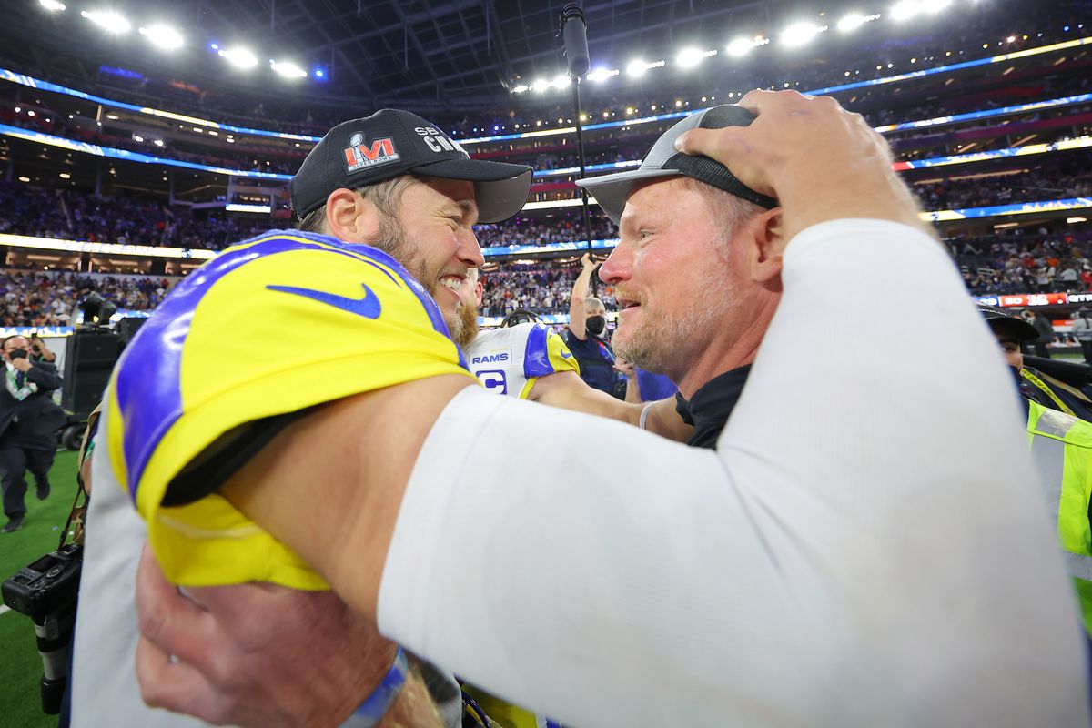 Matthew Stafford #9 of the Los Angeles Rams celebrates with Rams General Manager Les Snead after defeating the Cincinnati Bengals during Super Bowl LVI at SoFi Stadium on February 13, 2022 in Inglewood, California. The Los Angeles Rams defeated the Cincinnati Bengals 23-20.