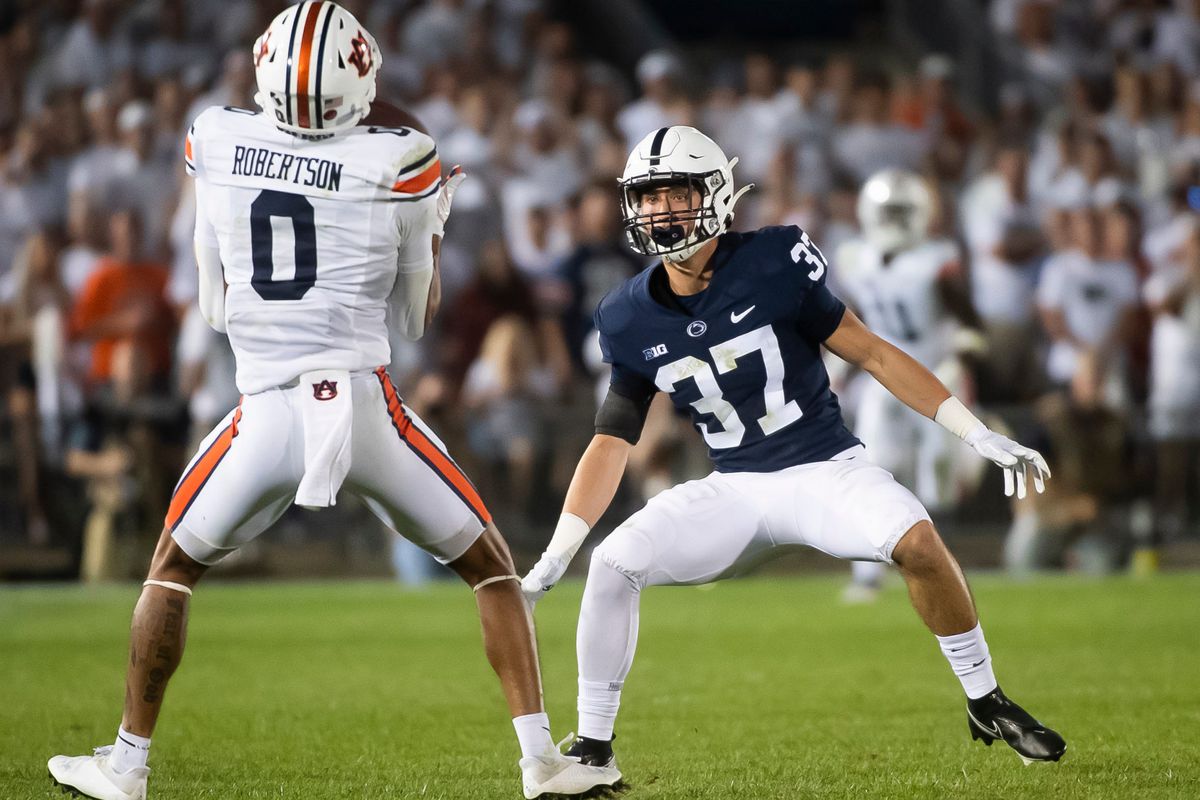 Penn State gunner Drew Hartlaub (37) is the first Nittany Lion down the field to cover a punt return by Auburn’s Demetris Robertson (0) in the fourth quarter at Beaver Stadium on Saturday, Sept. 18, 2021, in State College. Robertson signaled and completed a fair catch.&nbsp;