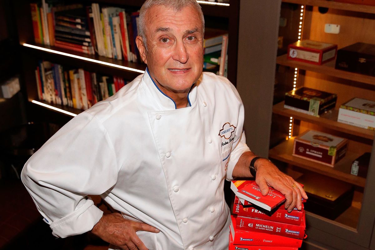 Andre Rochat in his new culinary library at Andre's Restaurant & Lounge. 