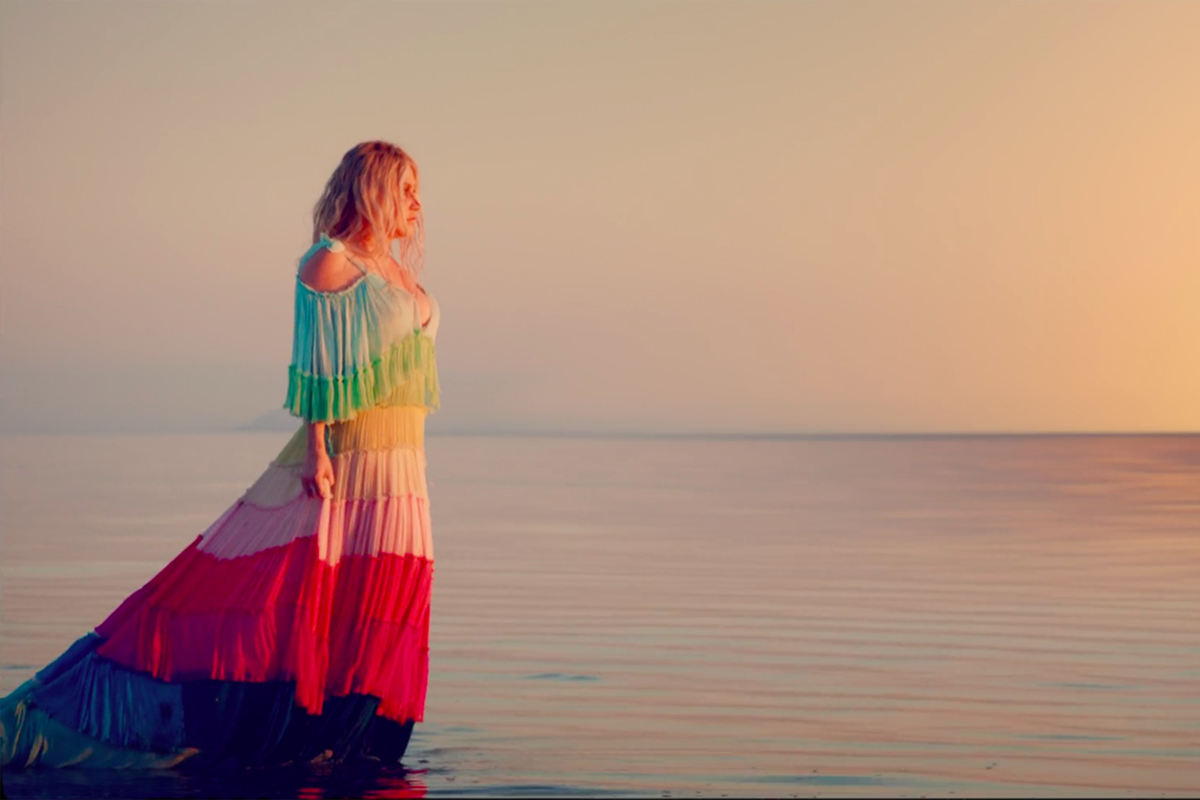 Kesha wears a custom Olima Atelier gown in her “Praying” music video.
