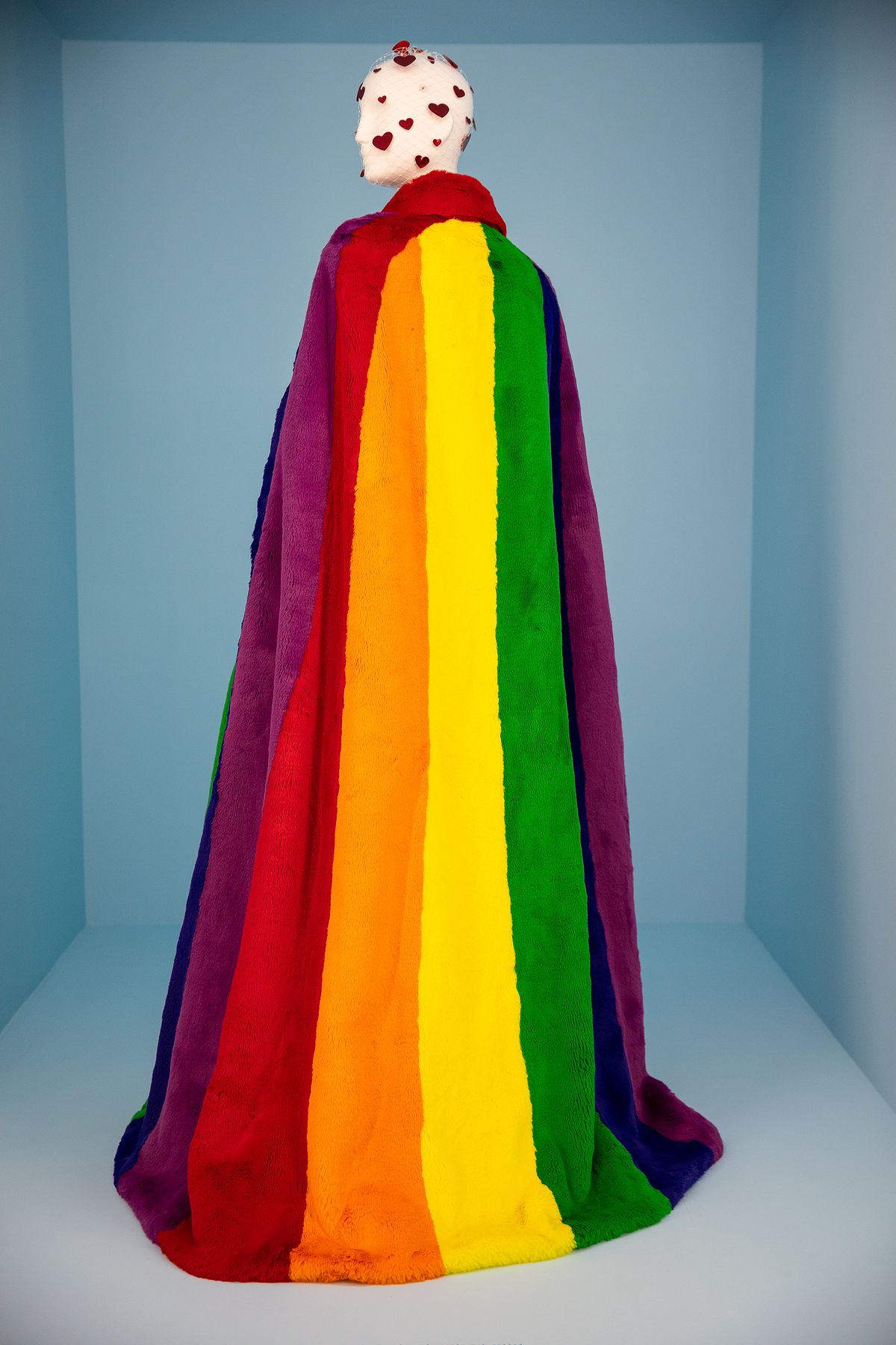 A furry rainbow cape.