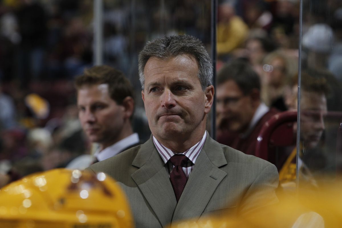 Gopher head coach Don Lucia broke Doug Woog's record Friday for the most wins by a University of Minnesota men's hockey coach.