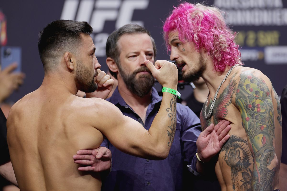 Opponents Pedro Munhoz of Brazil and Sean O’Malley face off during the UFC 276 ceremonial weigh-in at T-Mobile Arena on July 01, 2022 in Las Vegas, Nevada.
