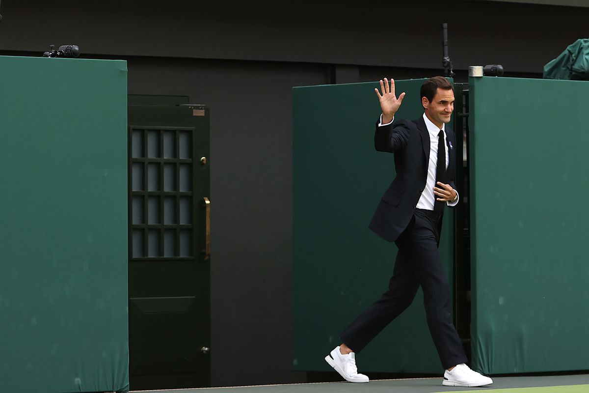 Roger Federer of Switzerland walks onto court during the Centre Court Centenary Celebration during day seven of The Championships Wimbledon 2022 at All England Lawn Tennis and Croquet Club on July 03, 2022 in London, England.