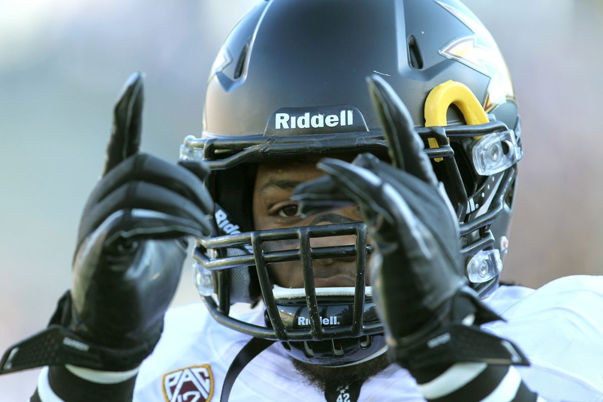 Linebacker Vontaze Burfict of the Arizona State Sun Devils gestures as he warms up for the game with the UCLA Bruins at the Rose Bowl on November 5, 2011 in Pasadena, California.  UCLA won 29-28.  (Photo by Stephen Dunn/Getty Images)