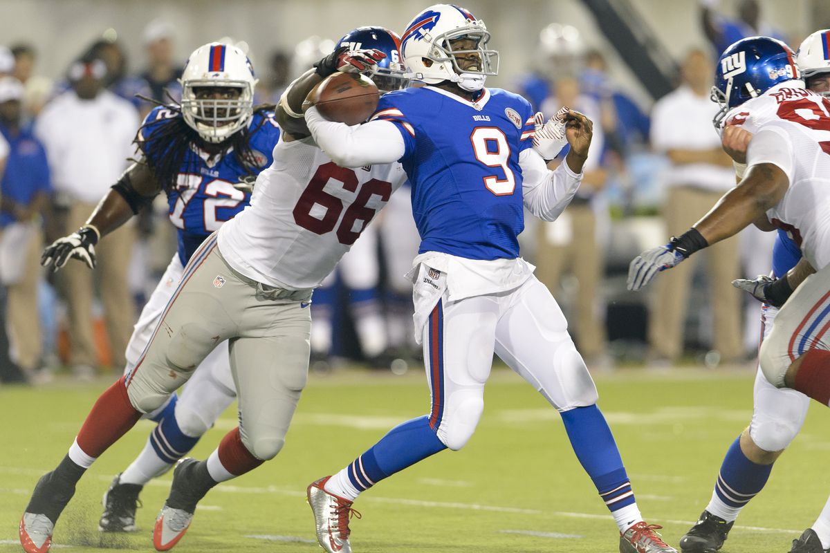 Jordan Stanton (66) comes up with a strip sack during the 2014 Pro Football Hall of Fame Game.