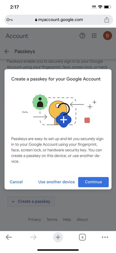 Mobile screen with pop-up window headed Create a passkey for your Google Account.