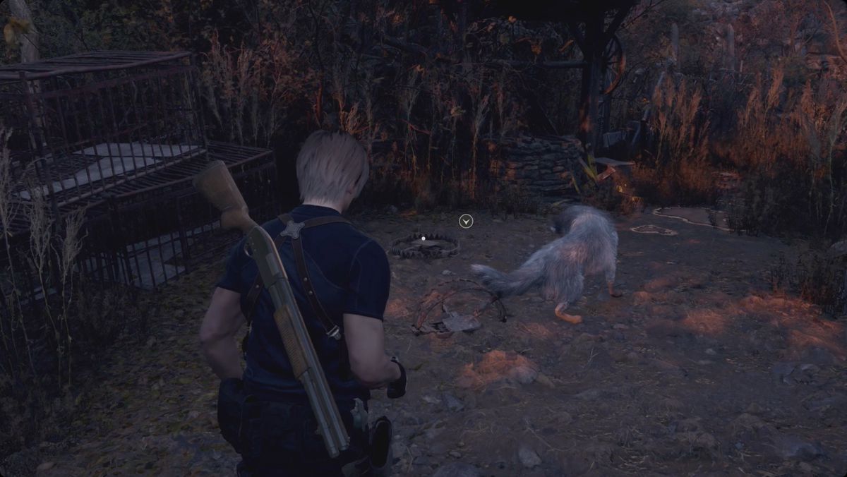 Resident Evil 4&nbsp;remake&nbsp;Leon approaching a wolf with its leg caught in a trap