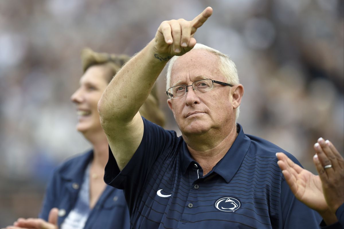 Penn State womens volleyball head coach Russ Rose points at the crowd as he is recognized on the field during a time out. The Penn State Nittany Lions defeated the Appalachian State Mountaineers 45-38 in overtime on September 1, 2018 at Beaver Stadium in State College, PA.