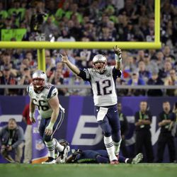 New England Patriots quarterback Tom Brady (12) celebrates a 4-yard touchdown against the Seattle Seahawks during the second half of NFL Super Bowl XLIX football game Sunday, Feb. 1, 2015, in Glendale, Ariz.