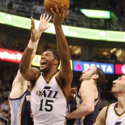 Utah Jazz forward Derrick Favors (15) shoots Wednesday, Feb. 4, 2015, at EnergySolutions Arena. The Grizzlies beat the Jazz, 100-90.