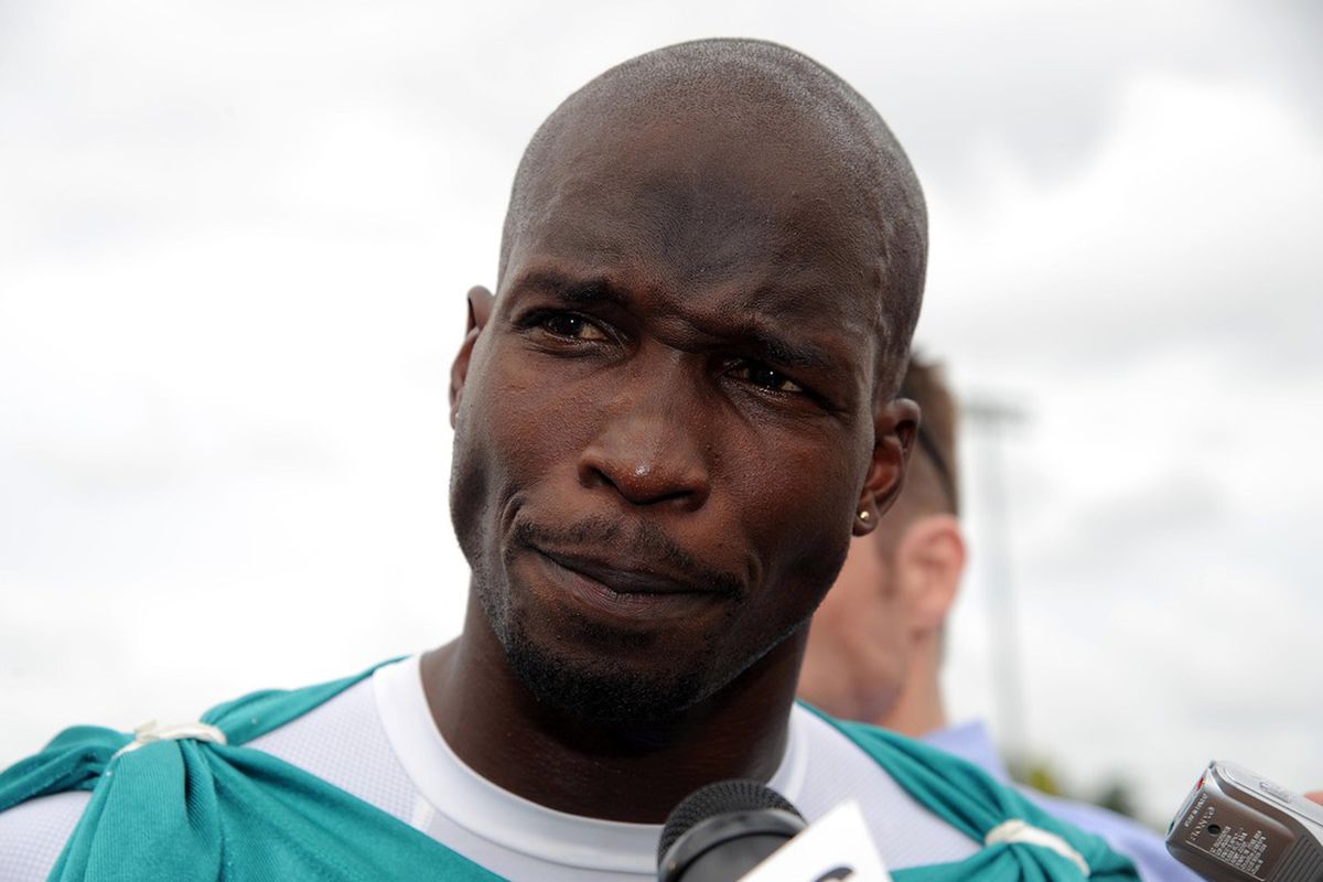 June 19, 2012; Davie, FL, USA; Miami Dolphins wide receiver Chad Ochocinco (85) addresses members of the media after minicamp at the Dolphins training facility. Mandatory Credit: Steve Mitchell-US PRESSWIRE