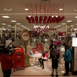 Rylee Bess, center, sits down to write a letter to Santa at the Macy's at City Creek Center in Salt Lake City on Friday, Dec. 9, 2016. Rylee, of Perry, has been diagnosed with cystic fibrosis and was granted a makeover by Macy's and Make-A-Wish Utah as part of the retailer's National Believe Day.