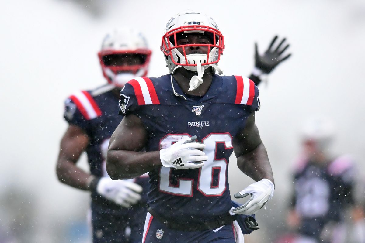 Running back Sony Michel of the New England Patriots runs onto the field prior to a game against the Cleveland Browns on October 27, 2019 at Gillette Stadium in Foxborough, Massachusetts.