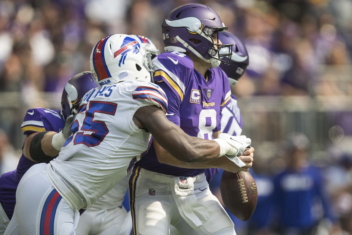 Minnesota Vikings quarterback Kirk Cousins (8) fumbled the football after he was hit by Buffalo Bills defensive end Jerry Hughes (55) US Bank Stadium Sunday September 23, 2018 in Minneapolis, MN. ] JERRY HOLT ‚Ä¢ jerry.holt@startribune.com