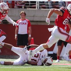 Utah Utes tight end Brant Kuithe (80) breaks a tackle by Idaho State Bengals linebacker Kennon Smith (31) and goes in for a touchdown against the Idaho State Bengals during NCAA football in Salt Lake City on Saturday, Sept. 14, 2019.