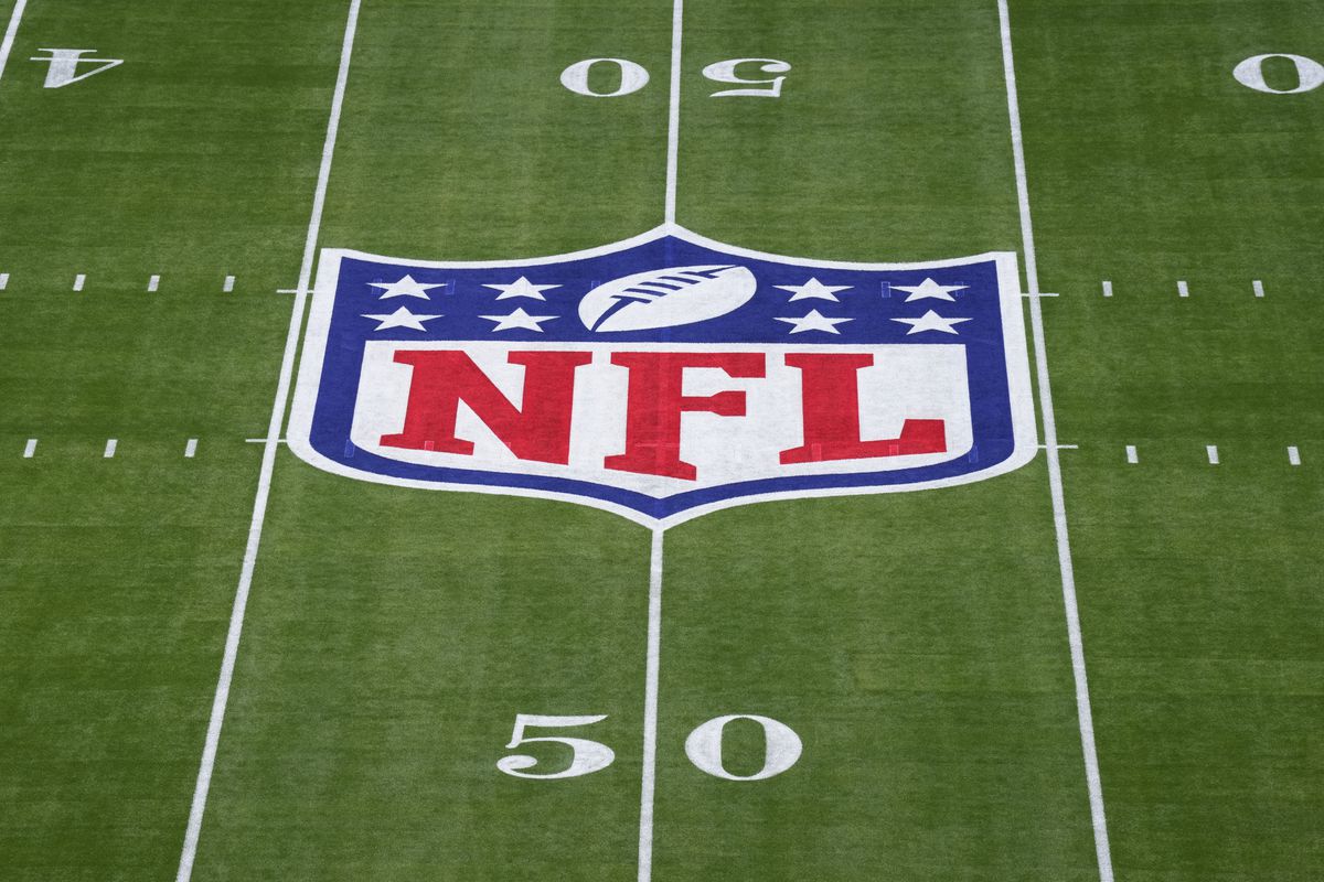 Elevated view of the NFL Shield logo painted on the field prior to Super Bowl LVII between the Kansas City Chiefs and the Philadelphia Eagles at State Farm Stadium on February 12, 2023 in Glendale, Arizona.