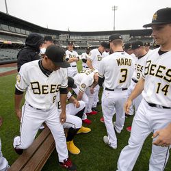The Salt Lake Bees players and coaches gather for a team photo as they hold their media day at Smith's Ballpark on Tuesday, April 2, 2019.