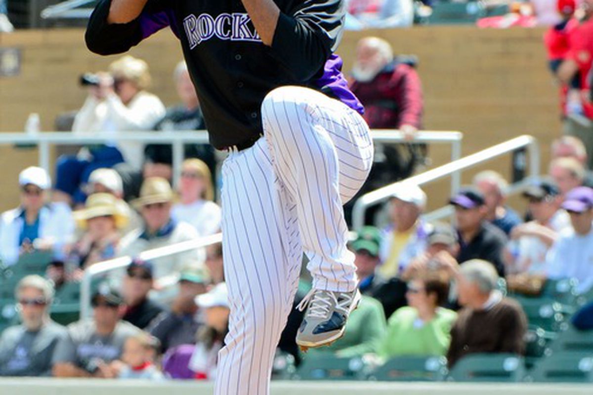 Mar. 19, 2012; Scottsdale, AZ, USA; Colorado Rockies starting pitcher Juan Nicasio (44) throws during the first inning against the Los Angeles Angels at Salt River Fields at Talking Stick. Mandatory Credit: Matt Kartozian-US PRESSWIRE