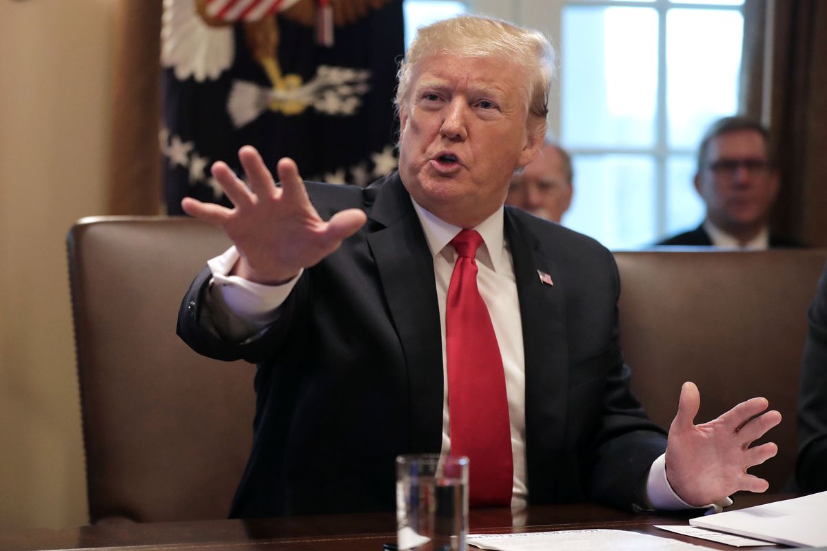 President Donald Trump speaks with reporters during a Cabinet meeting at the White House in January 2019.