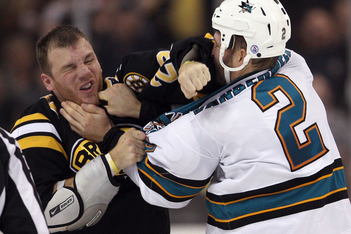 Jim Vandermeer helps Shawn Thornton squeeze a painful zit on his chin