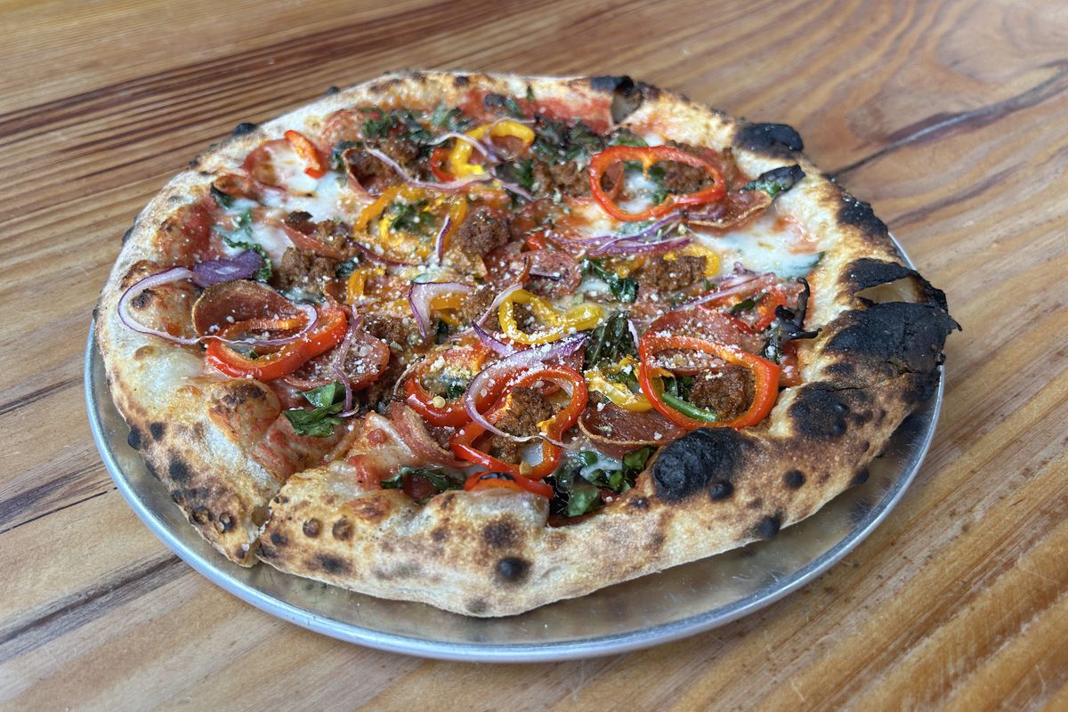 A pizza with house-made cheese, pepperoni, and house-made chorizo at Living Haus in Portland, Oregon.