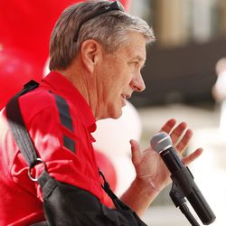 FILE - Utah Athletics Director Dr. Chris Hill speaks during the Red Friday Rally at City Creek Center as part of the Utes' homecoming activities in Salt Lake City Friday, Oct. 9, 2015.
