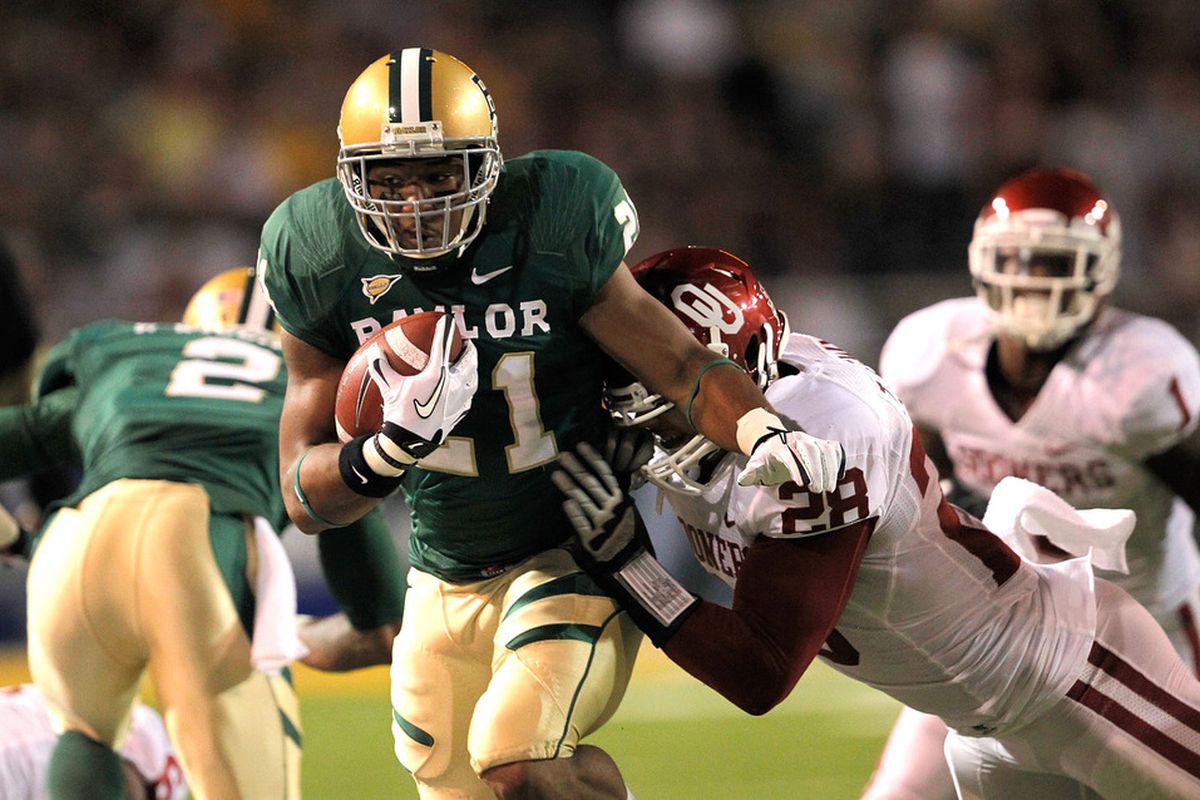 WACO, TX - NOVEMBER 19:  Jarred Salubi #21 of the Baylor Bears runs during a game against the Oklahoma Sooners at Floyd Casey Stadium on November 19, 2011 in Waco, Texas.  (Photo by Sarah Glenn/Getty Images)